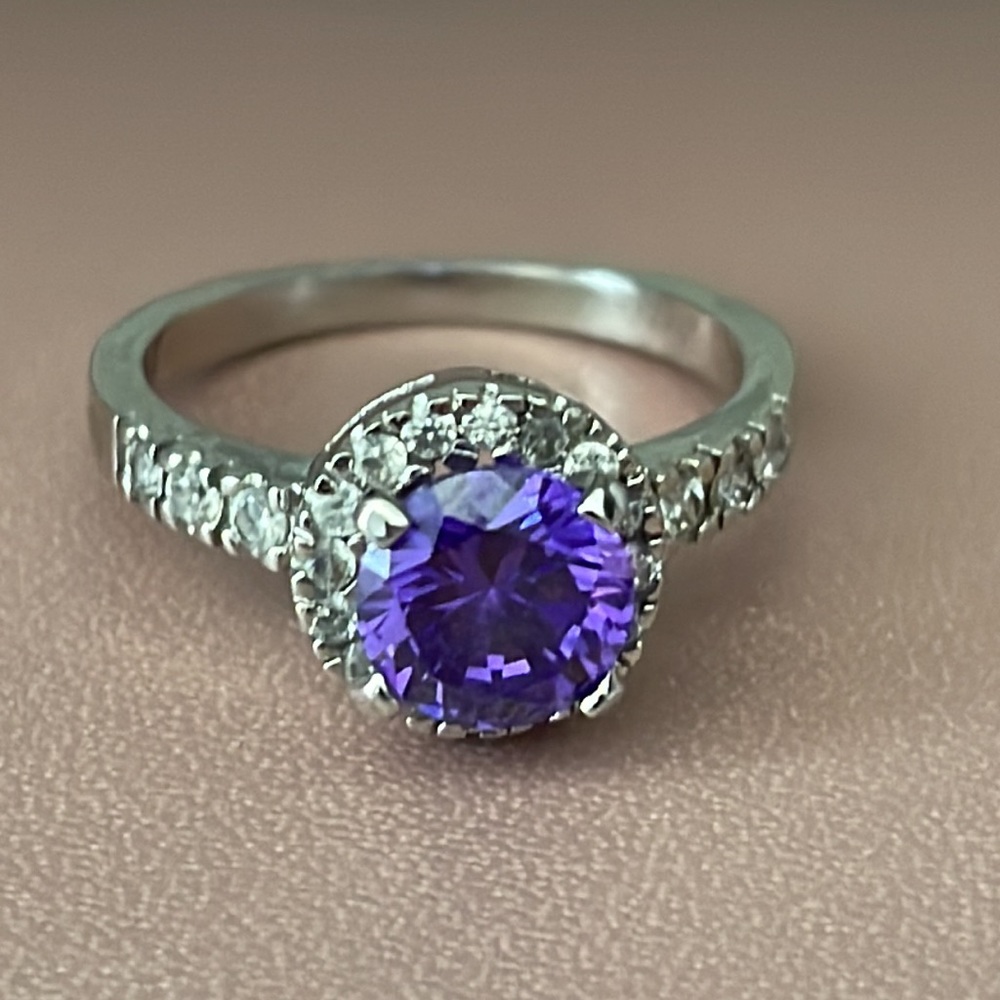 Silver Ring with white and a purple round crystal